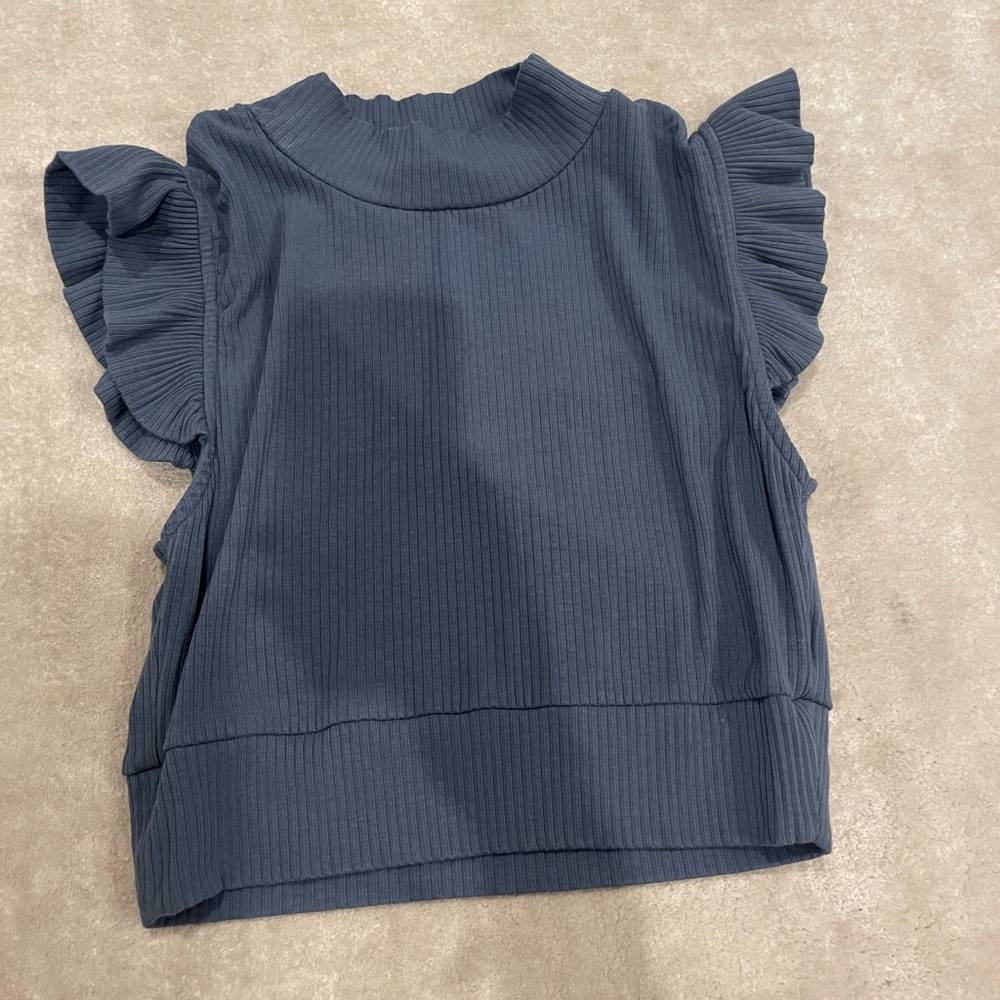Storia, blue ruffle, cropped, size kids large.